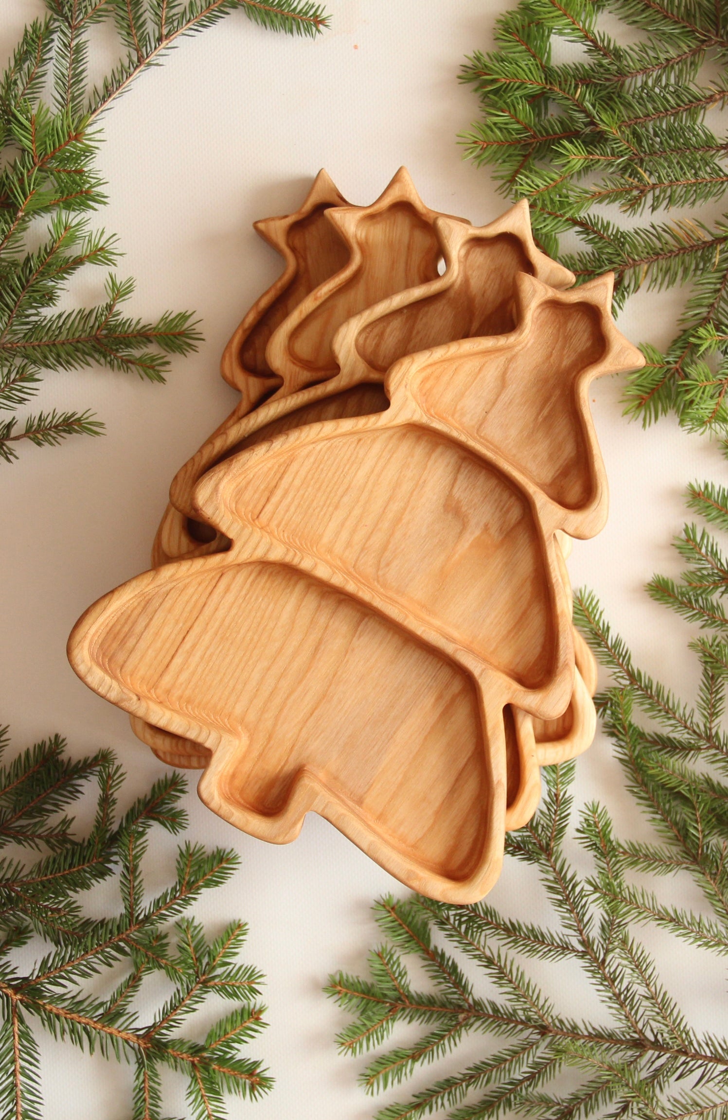 Rustic Christmas serving board on a decorated holiday table