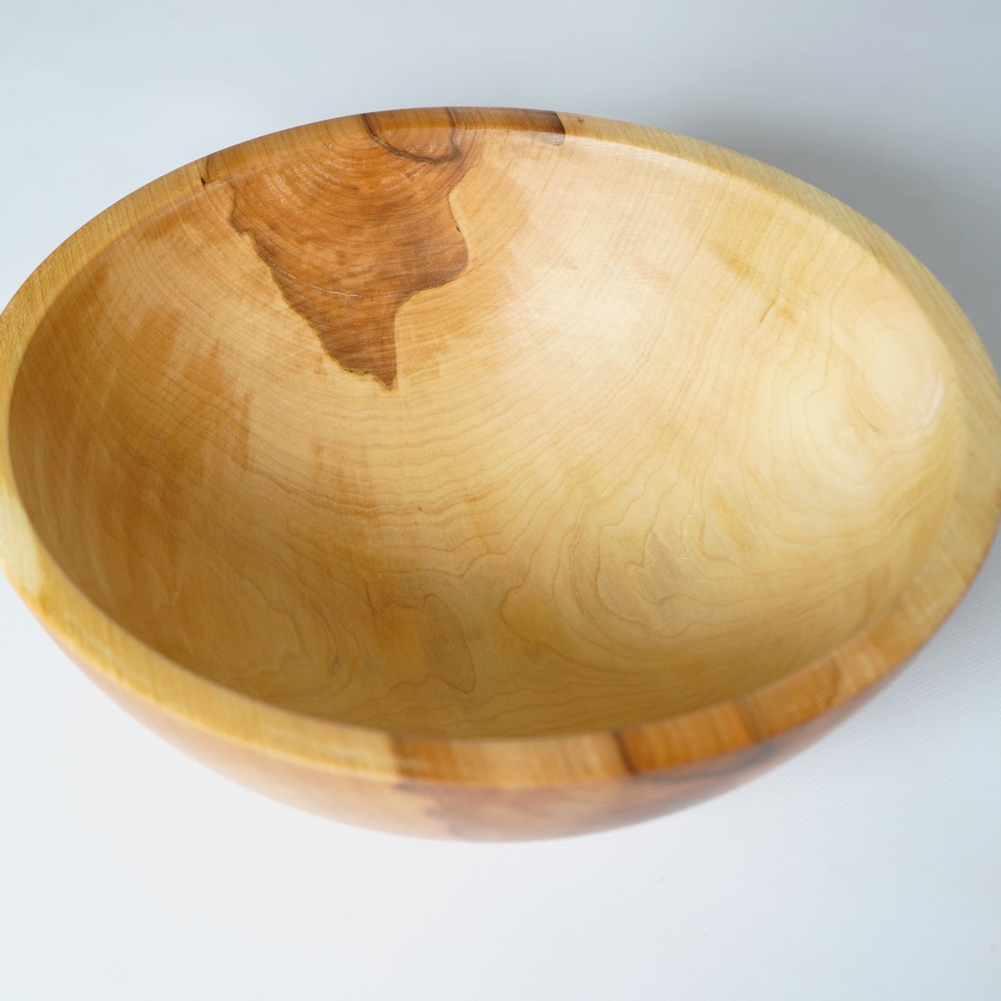 Solid maple wooden salad bowl with natural grain, handcrafted in Ukraine
