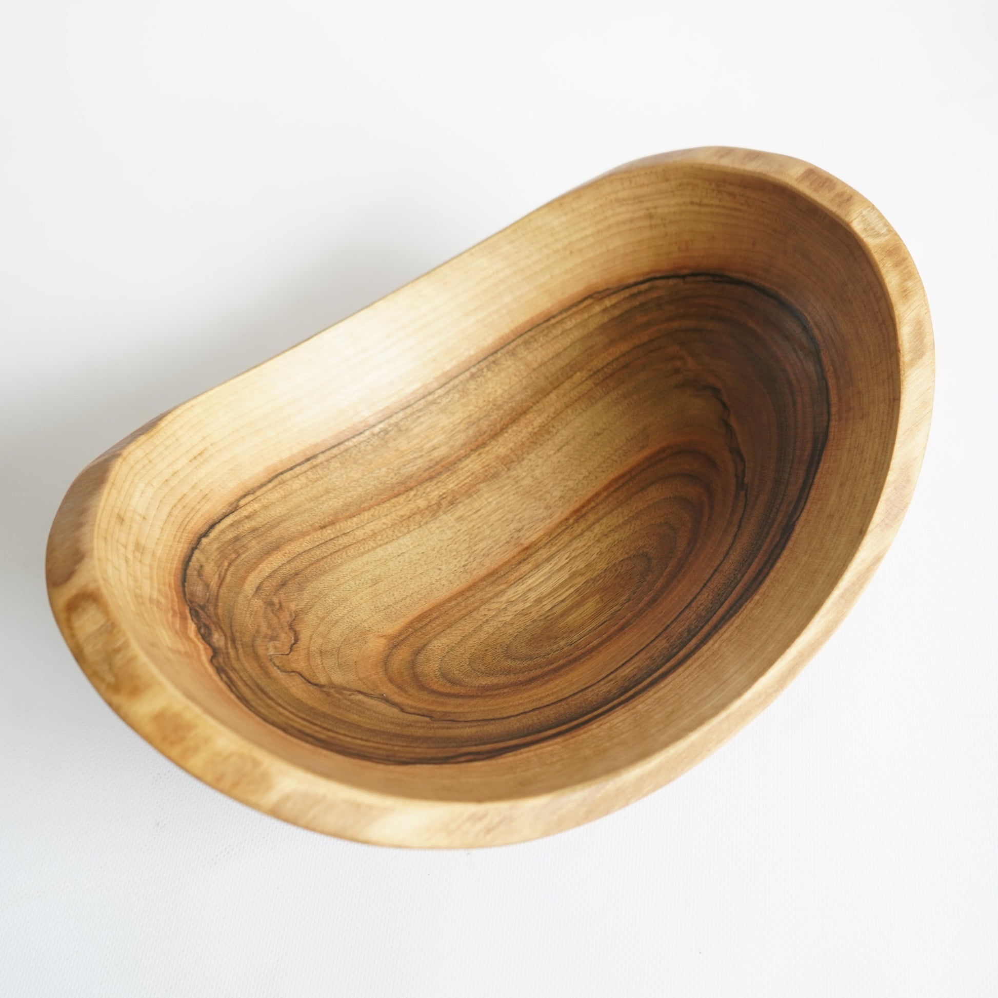 handcrafted walnut fruit bowl with natural bark edge