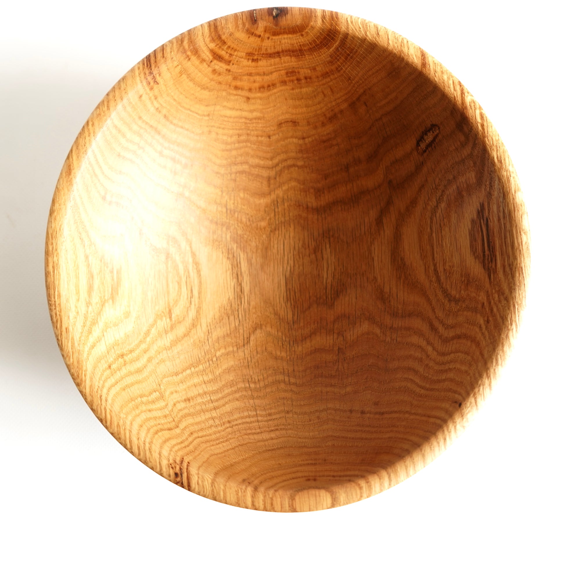Natural oak wood bowl for kitchen and dining table decor
