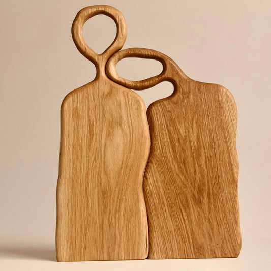 Wooden serving board set with elegant carved design