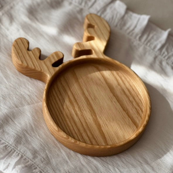 Cute deer shaped serving board made of natural wood for snacks and sweets