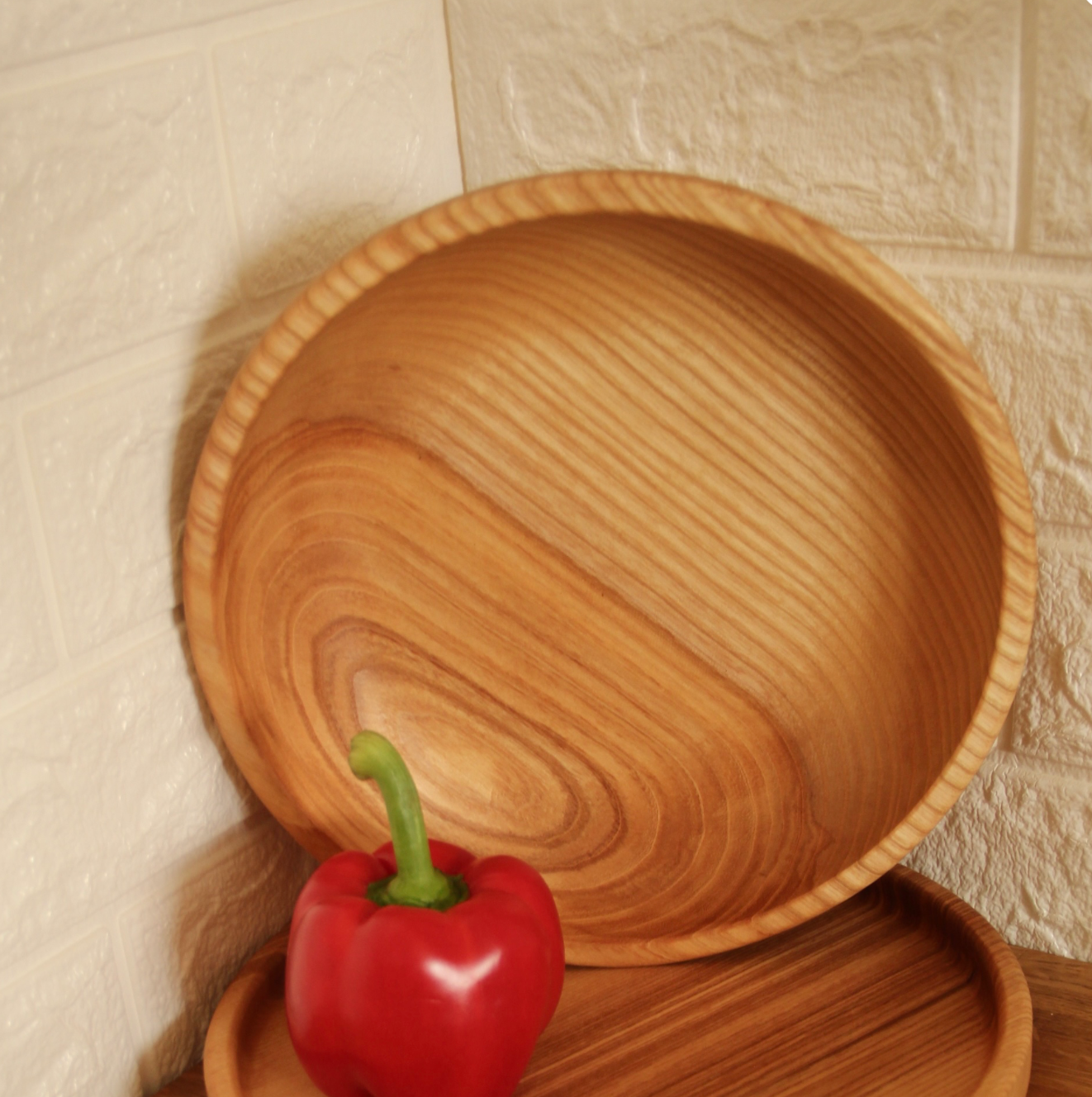 Handcrafted wooden bowl ideal for salads, fruits, or snacks