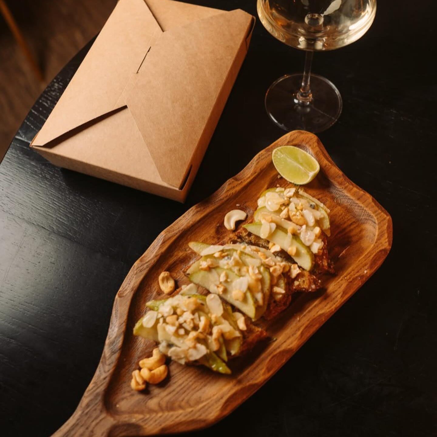 Close-up of elegant serving board for cheese, meats, and fruits