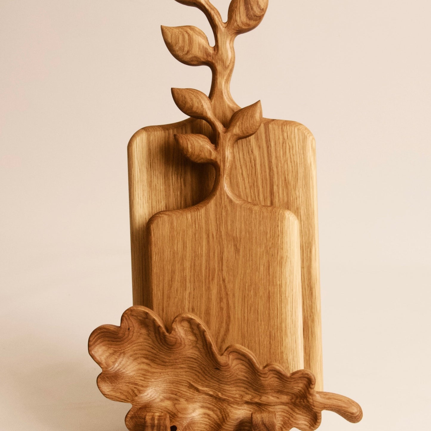 Handmade wooden board set ideal for slicing, chopping, and serving