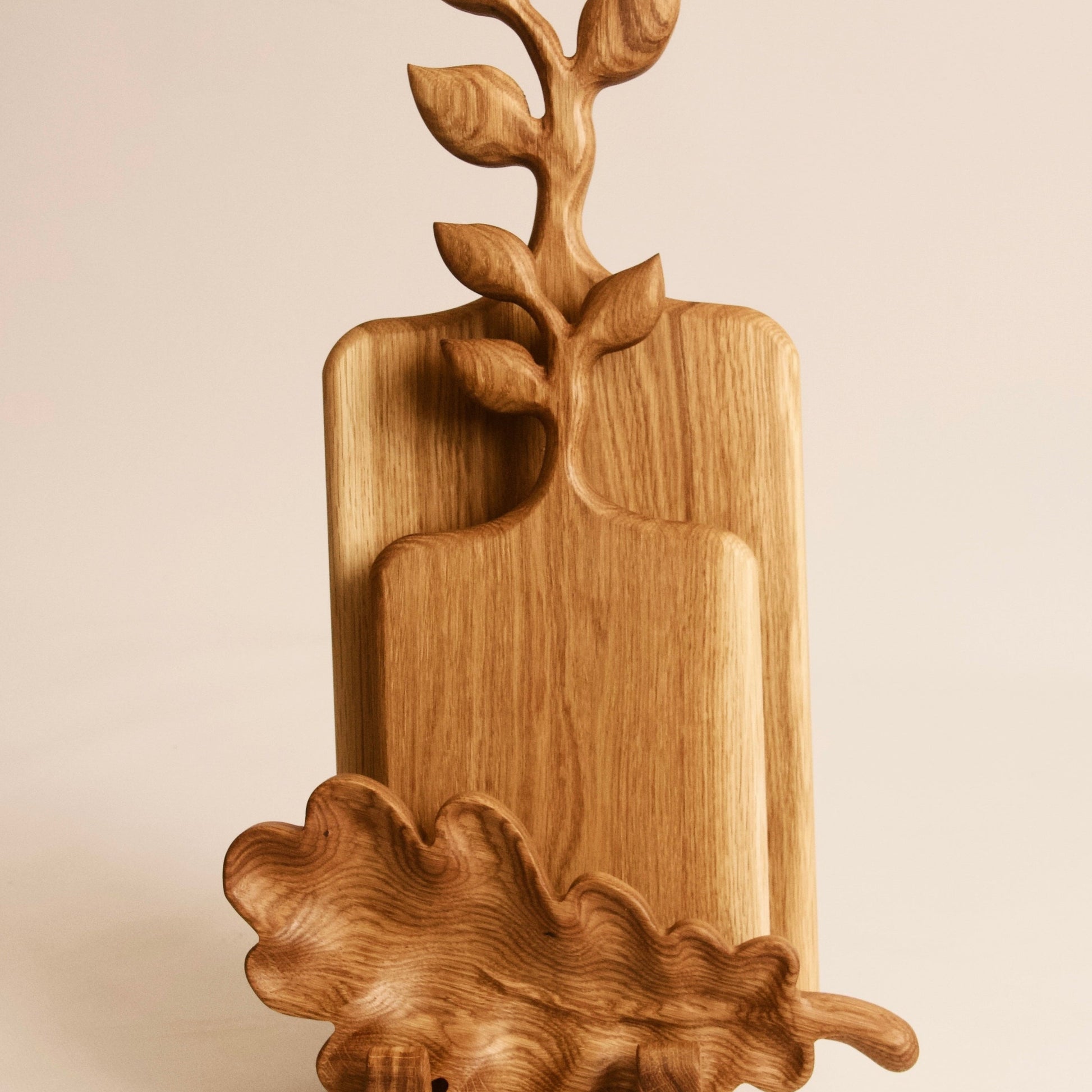 Handmade wooden board set ideal for slicing, chopping, and serving