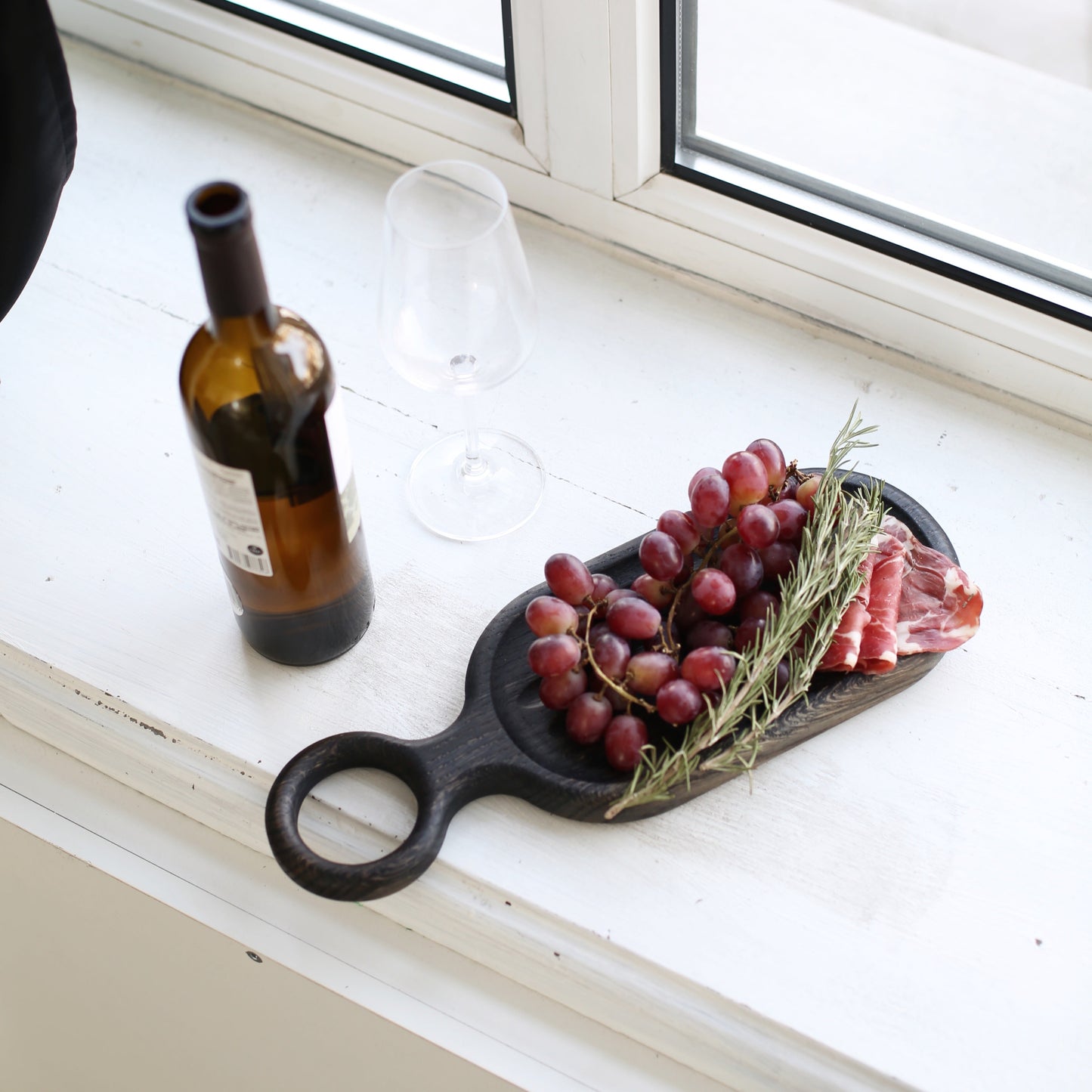Holiday gift wrapped oak serving board with ribbon