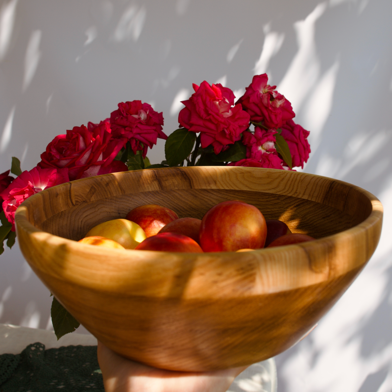 Side view of oak and ash serving bowl with natural grain texture