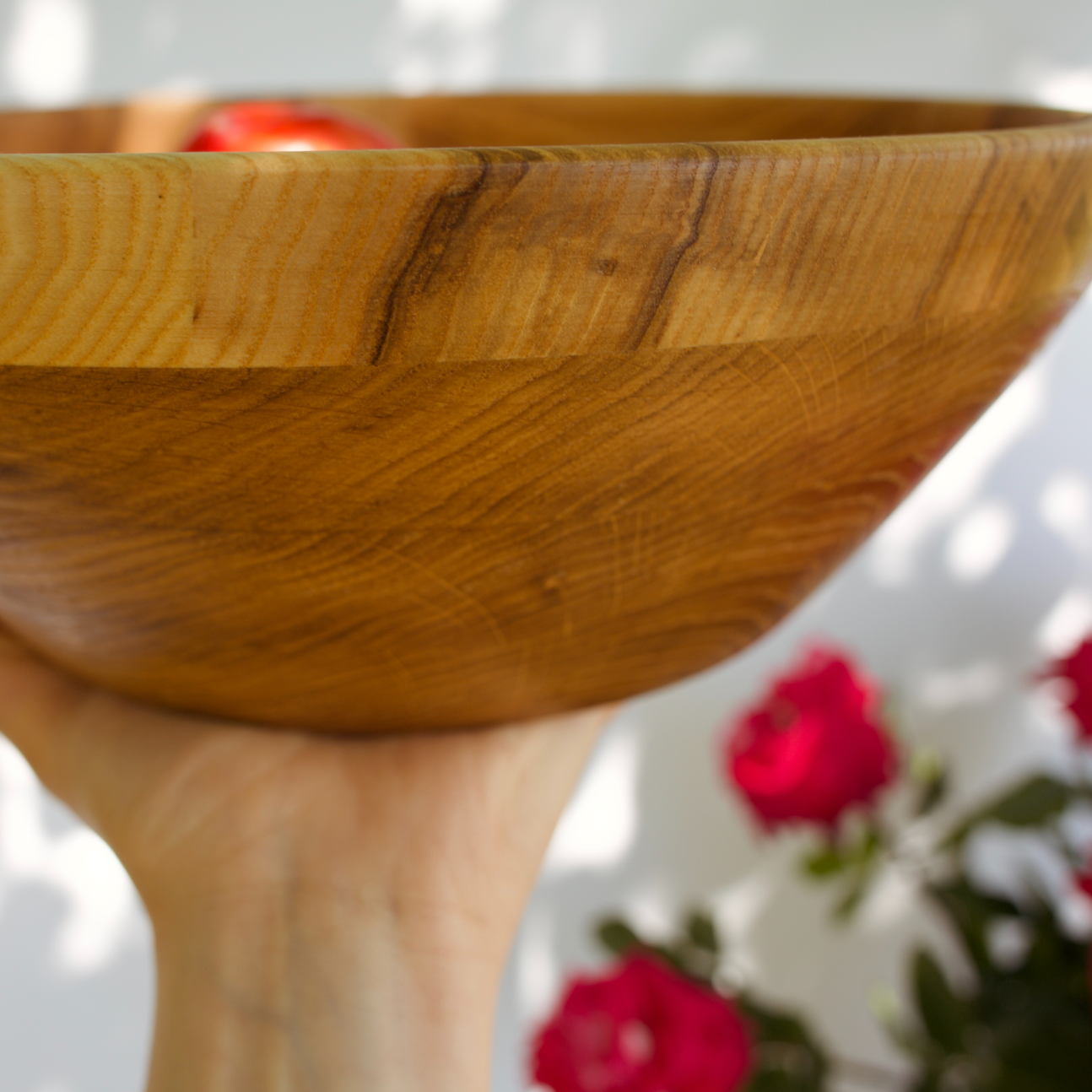 Oak and ash wooden bowl filled with fresh green salad