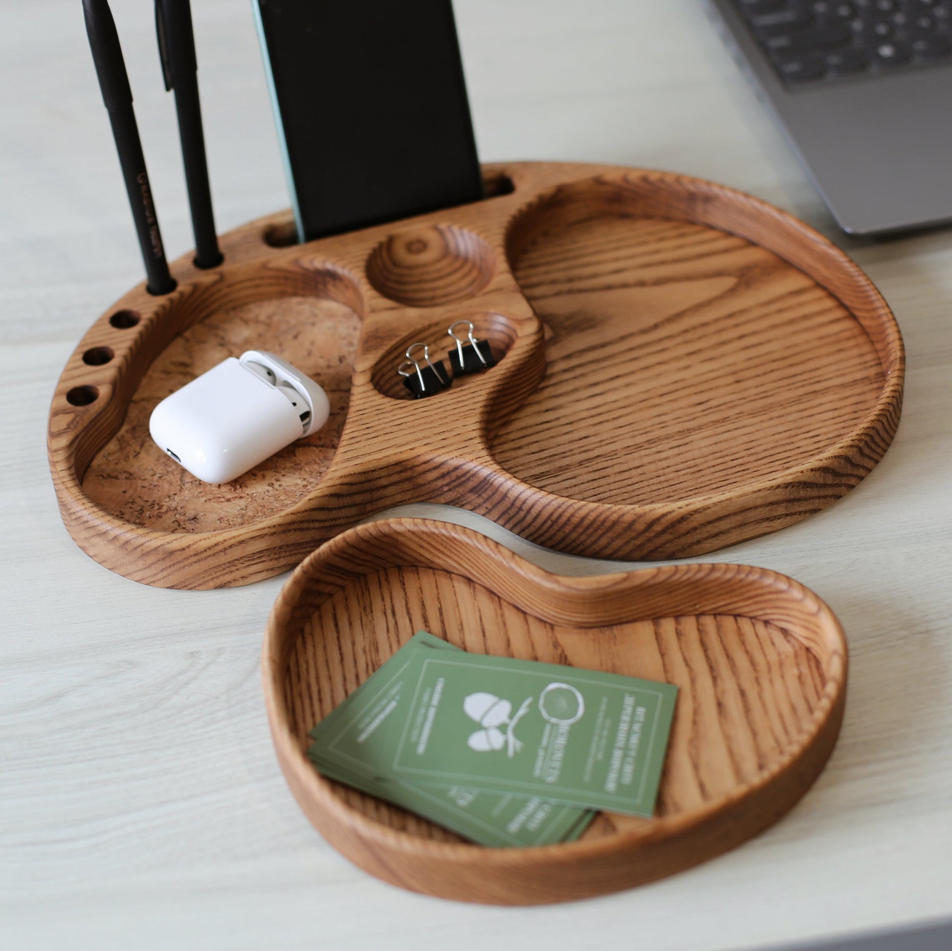 Wooden desk organizer with pen holder, phone slot, and cork headphone compartment