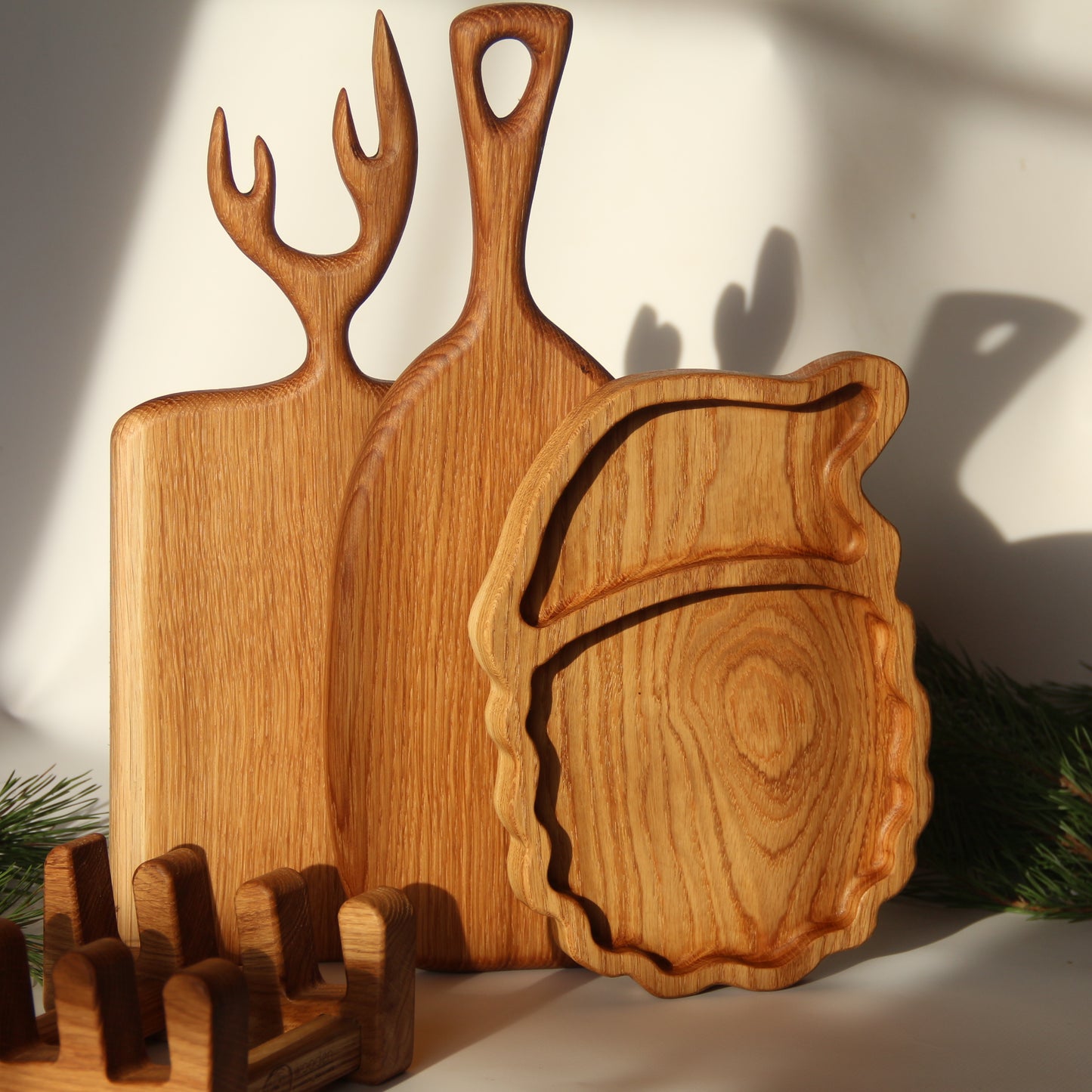 Gift-ready oak cutting board collection with festive Mykolay design