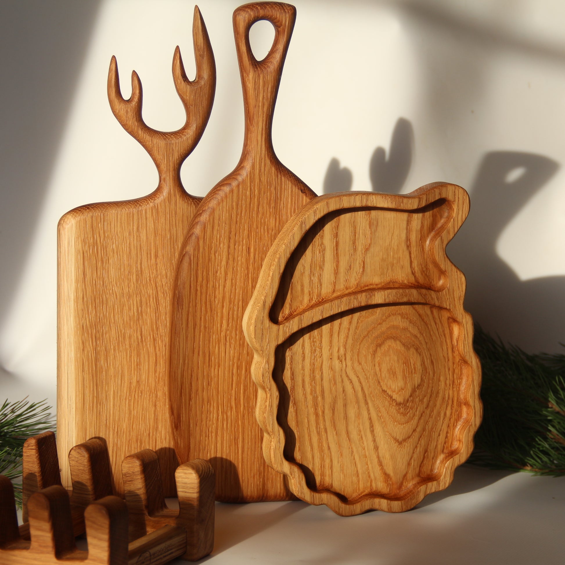 Gift-ready oak cutting board collection with festive Mykolay design