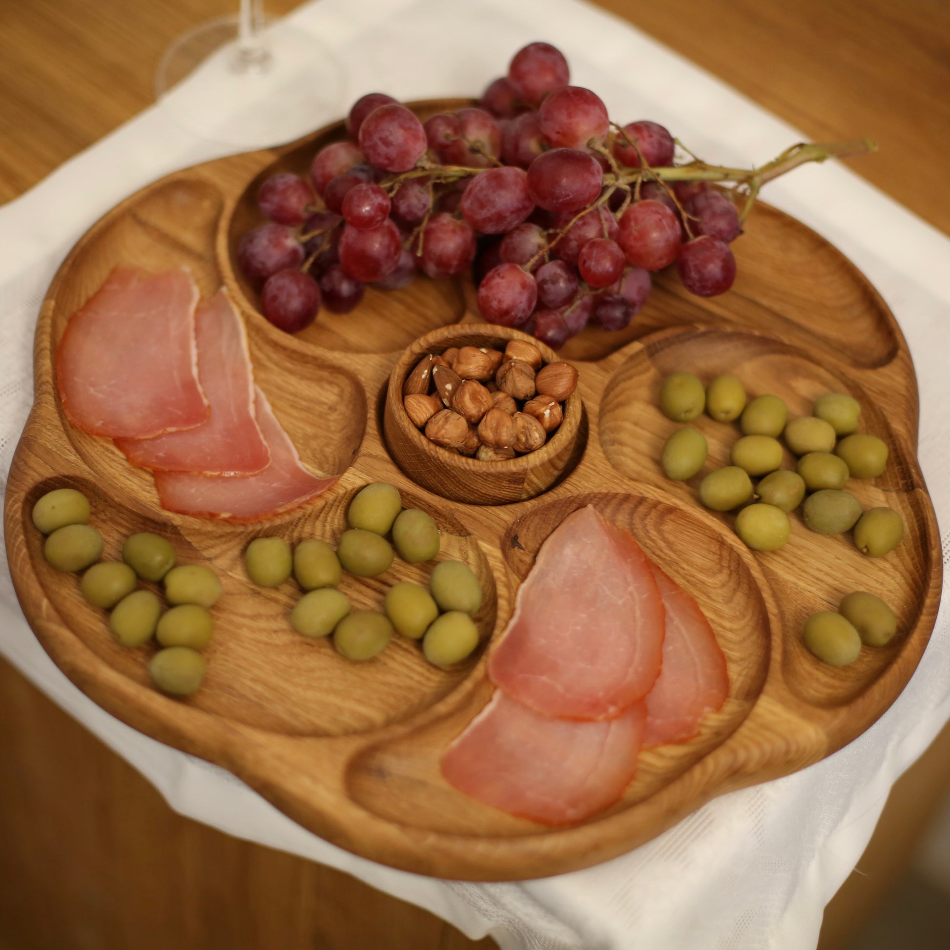 Wooden serving platter with floral design and seven compartments