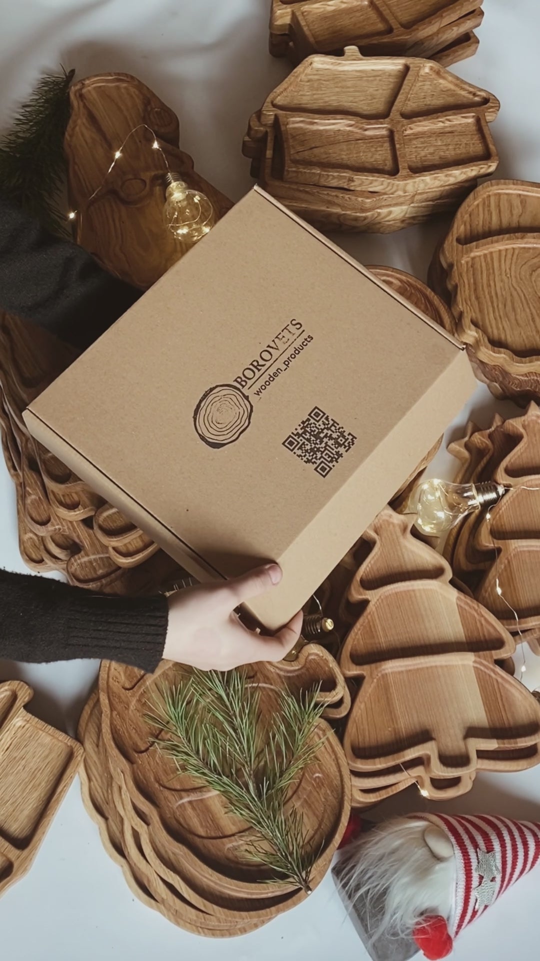 Wooden holiday plate wrapped as a Christmas gift