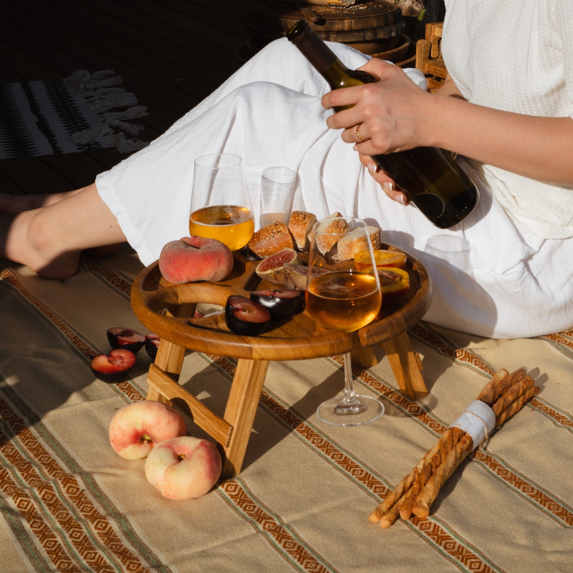 Foldable ash wood wine table perfect for outdoor picnics