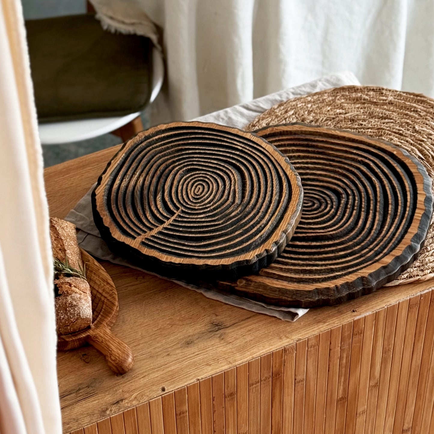Round oak serving board with rustic relief surface