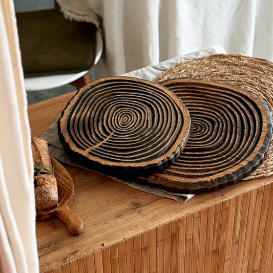 Round oak serving board with rustic relief surface
