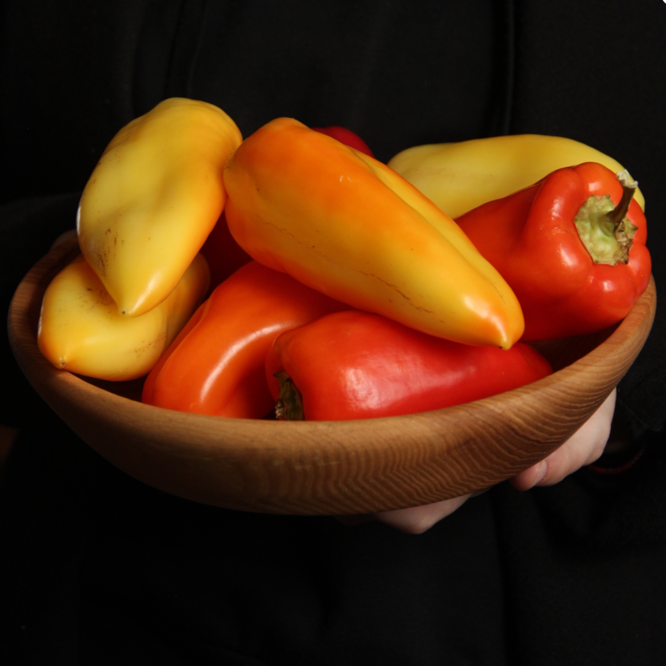 Handcrafted wooden bowl ideal for salads, fruits, or snacks