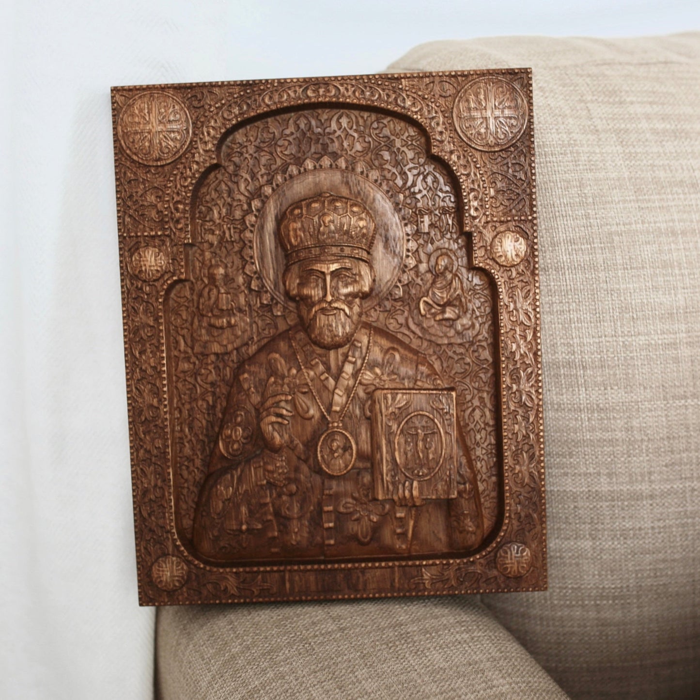 Hand-carved wooden icon of Saint Nicholas made from natural oak wood