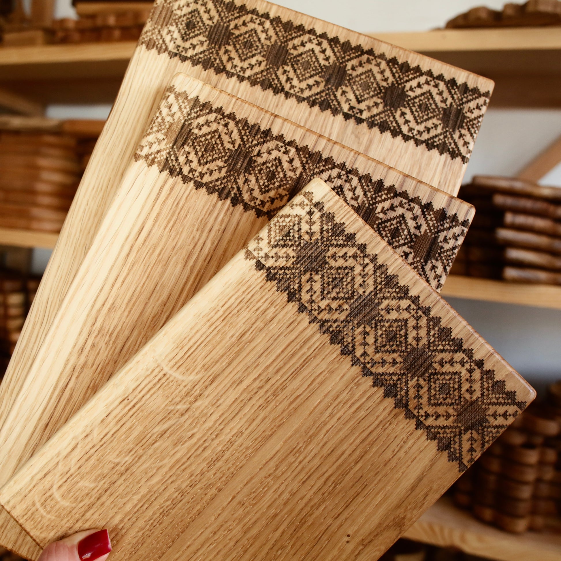 Decorative kitchen cutting boards on wooden stand