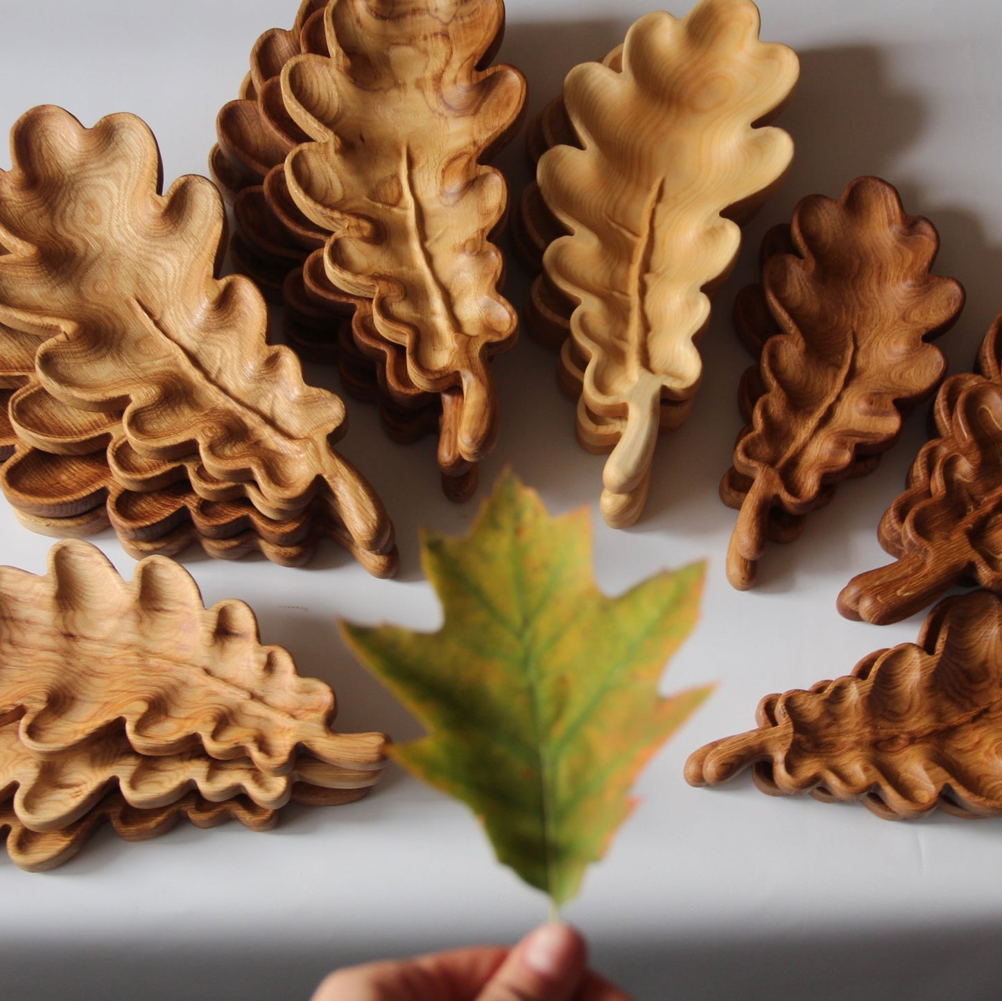 Natural wooden oak leaf serving tray for festive snacks and holiday decor