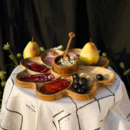 Large oak appetizer plate with floral design, mini bowl, and honey dipper