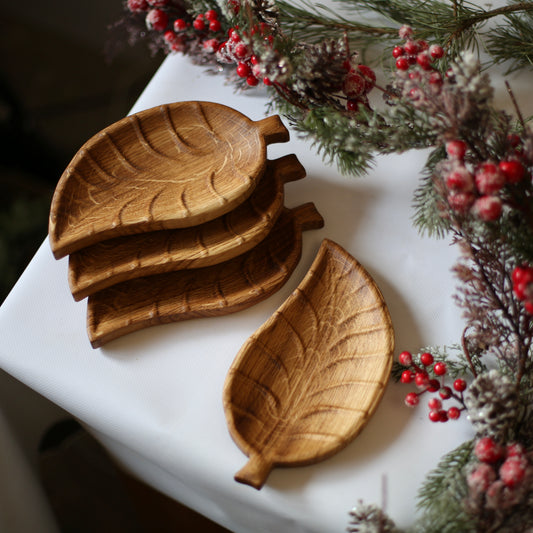Small wooden serving plate in the shape of a leaf