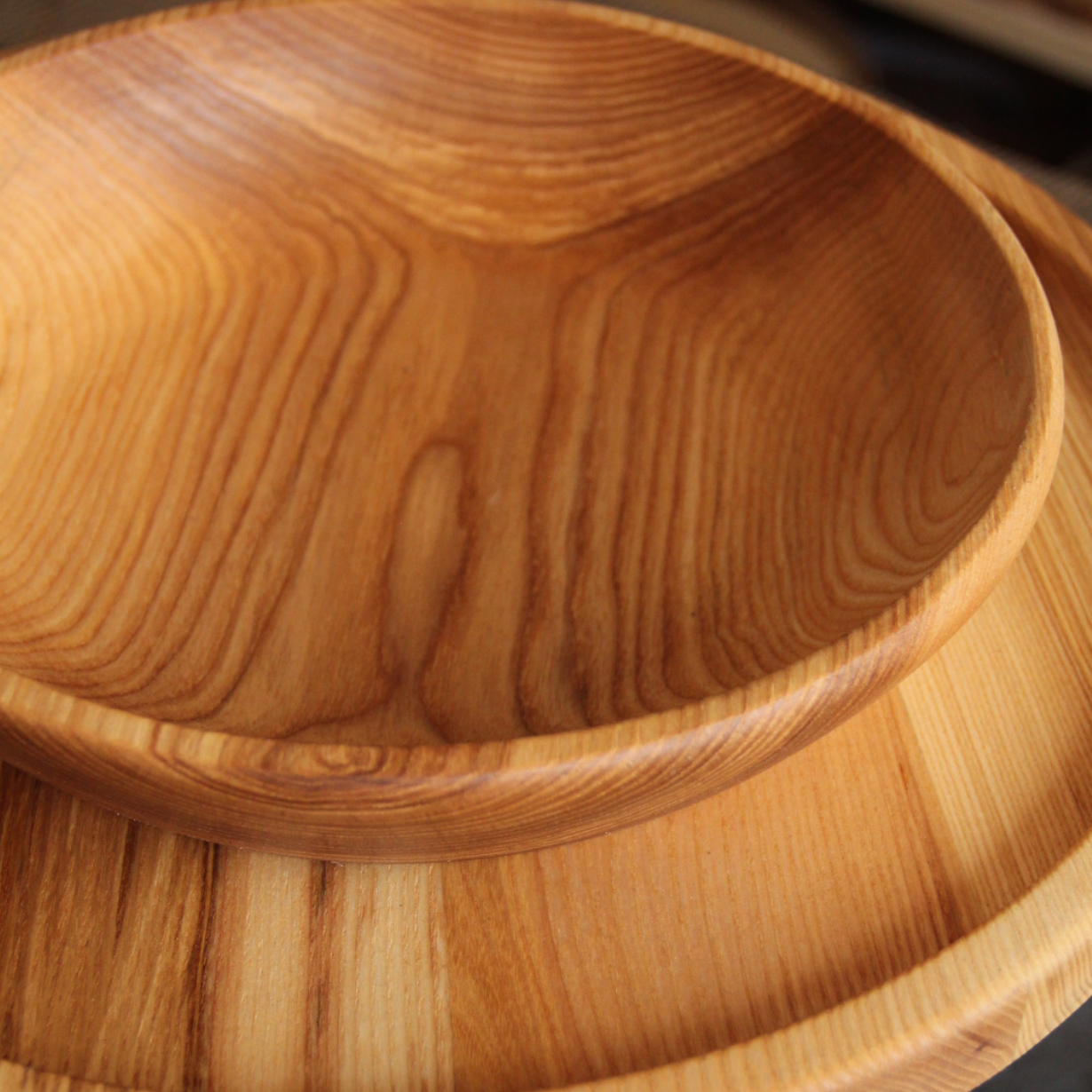 Close-up of natural ash wood grain and handcrafted finish