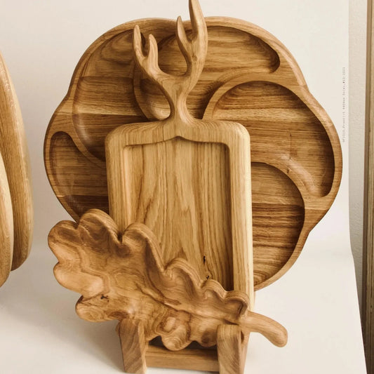 Set of three oak serving boards with natural wood texture